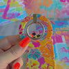 Sunset Hibiscus vibrant floral MagSafe phone grip ring with orange pink yellow and teal tropical pattern compatible with iPhone and Samsung