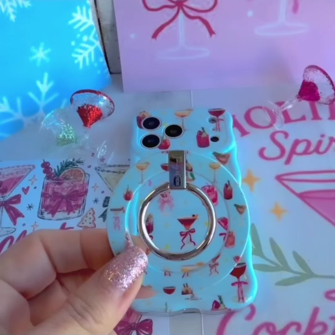 Video: Holiday Spirits, Please? grip ring shown close up, then snapped onto the matching case and held with one finger through the silver ring