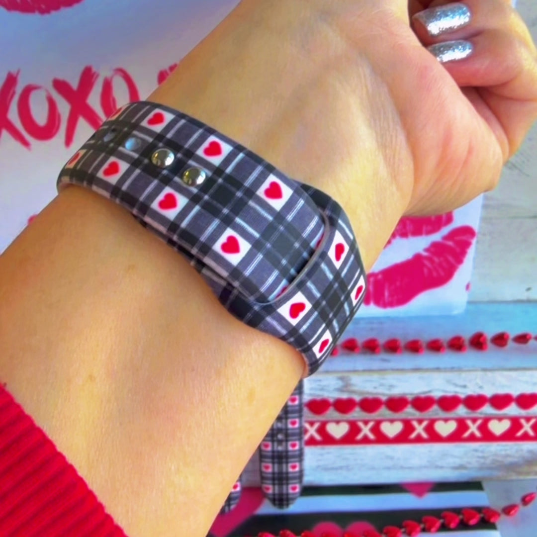 Plaid Crush Vibes Apple Watch band with black buffalo check, red hearts, and XOXO Vibes Only message with Valentine's decorations
