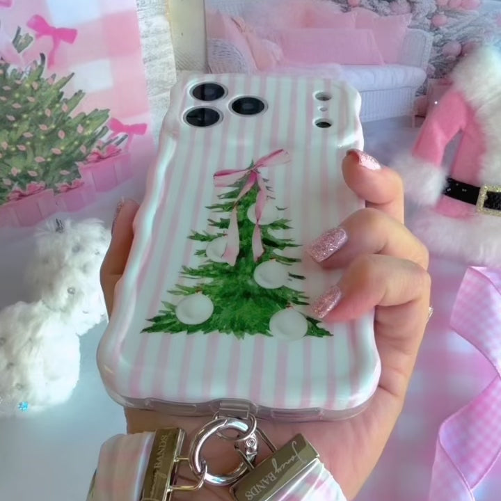 Video: clipping the Pretty in PinkMas scrunchie phone wrist strap to a phone and wearing it on the wrist