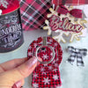 Video: the Buffalo Plaid Snowflake matching set, snapping the MagSafe grip ring onto the case, then wearing the matching scrunchie phone wrist strap