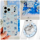 Snow Pretty In Blue iPhone Matching Set - powder blue MagSafe case with silver bows and navy snowflakes, matching Hold It Fancy grip ring and scrunchie phone wrist strap from Fancy Bands