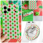 Tinsel & Stardust iPhone Matching Set - cream MagSafe case with red and green retro starbursts, matching Hold It Fancy grip ring and scrunchie phone wrist strap from Fancy Bands
